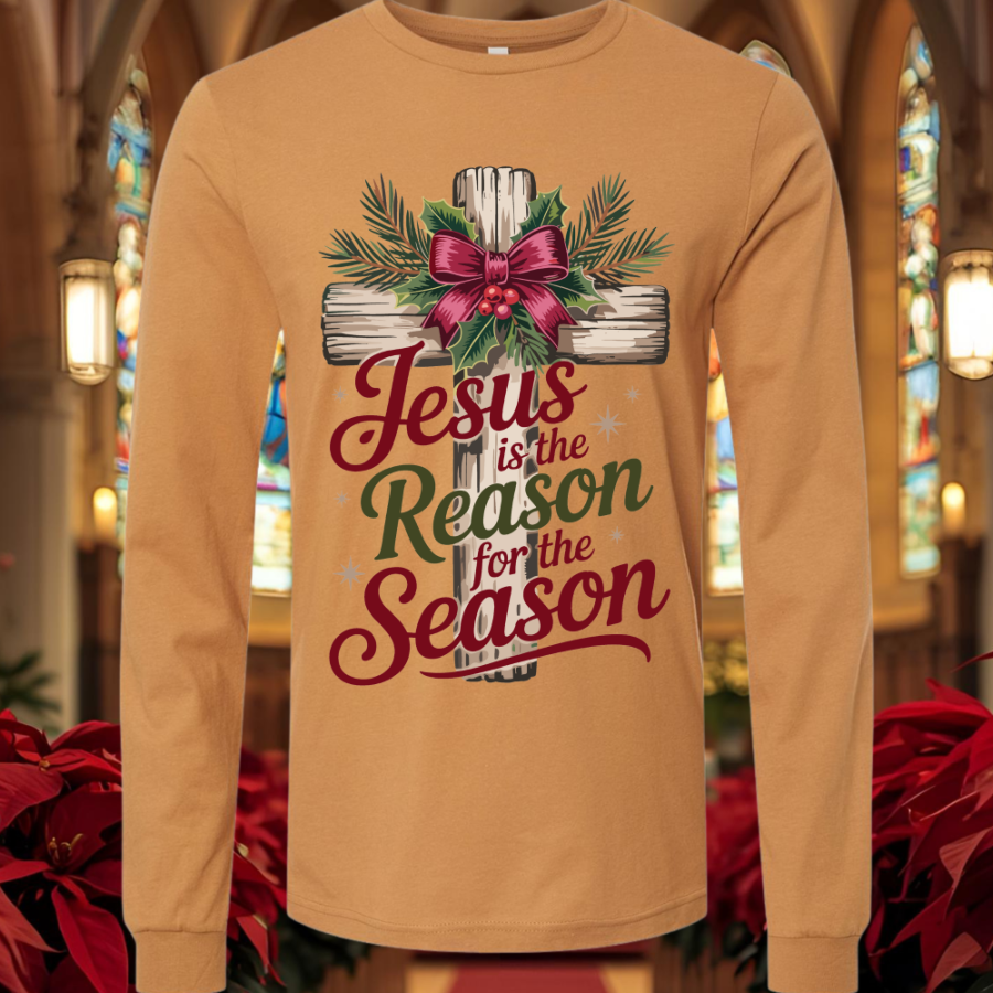 Beige/Toast long-sleeve shirt with Christmas design and text "Jesus is the Reason for the Season" in a church setting